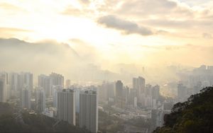 Preview wallpaper city, aerial view, buildings, fog, light