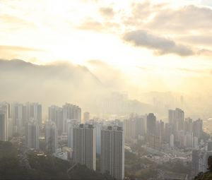 Preview wallpaper city, aerial view, buildings, fog, light