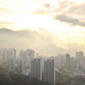 Preview wallpaper city, aerial view, buildings, fog, light