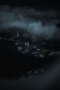 Preview wallpaper city, aerial view, buildings, clouds, dark