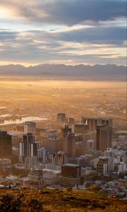 Preview wallpaper city, aerial view, buildings, mountains