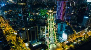 Preview wallpaper city, aerial view, buildings, road, lights, night