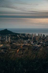 Preview wallpaper city, aerial view, cityscape, water, mountain, grass