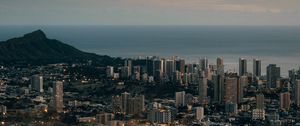 Preview wallpaper city, aerial view, cityscape, water, mountain, grass