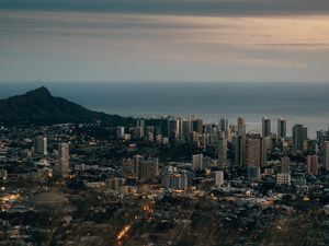 Preview wallpaper city, aerial view, cityscape, water, mountain, grass