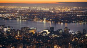 Preview wallpaper city, aerial view, cityscape, river, lights, twilight