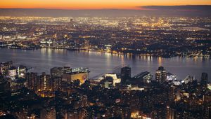 Preview wallpaper city, aerial view, cityscape, river, lights, twilight