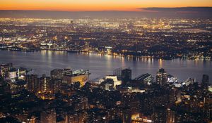 Preview wallpaper city, aerial view, cityscape, river, lights, twilight