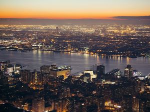 Preview wallpaper city, aerial view, cityscape, river, lights, twilight