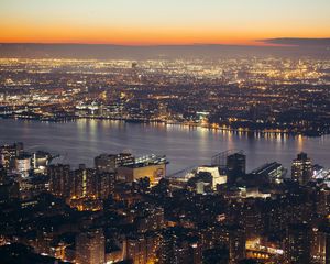 Preview wallpaper city, aerial view, cityscape, river, lights, twilight