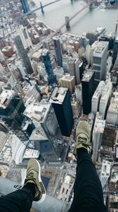 Preview wallpaper city, aerial view, legs, overview, buildings, height