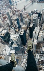 Preview wallpaper city, aerial view, legs, overview, buildings, height