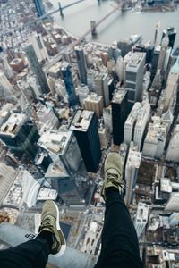 Preview wallpaper city, aerial view, legs, overview, buildings, height