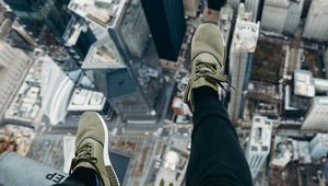 Preview wallpaper city, aerial view, legs, overview, buildings, height