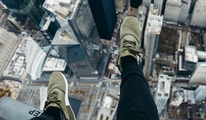 Preview wallpaper city, aerial view, legs, overview, buildings, height
