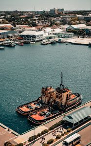 Preview wallpaper city, aerial view, pier, buildings, ships, water