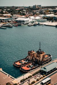Preview wallpaper city, aerial view, pier, buildings, ships, water