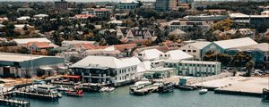 Preview wallpaper city, aerial view, pier, buildings, ships, water