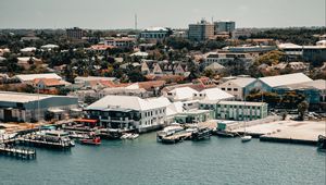 Preview wallpaper city, aerial view, pier, buildings, ships, water