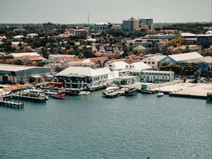 Preview wallpaper city, aerial view, pier, buildings, ships, water