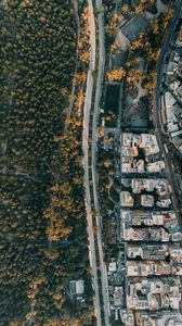 Preview wallpaper city, aerial view, road, buildings, forest