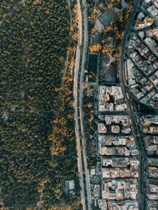 Preview wallpaper city, aerial view, road, buildings, forest