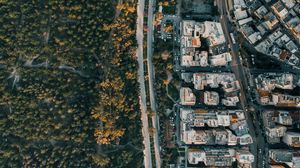 Preview wallpaper city, aerial view, road, buildings, forest