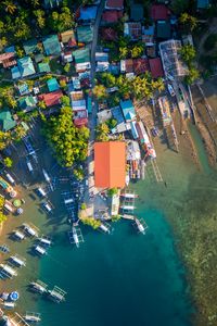 Preview wallpaper city, aerial view, roofs, coast