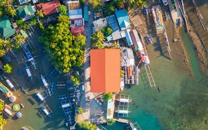 Preview wallpaper city, aerial view, roofs, coast