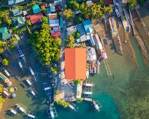 Preview wallpaper city, aerial view, roofs, coast