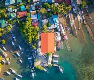 Preview wallpaper city, aerial view, roofs, coast