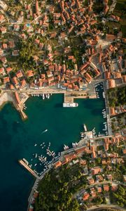 Preview wallpaper city, aerial view, roofs, coast, port