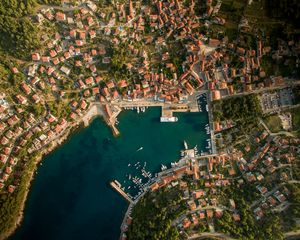 Preview wallpaper city, aerial view, roofs, coast, port