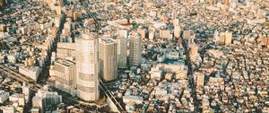 Preview wallpaper city, aerial view, roofs, roads