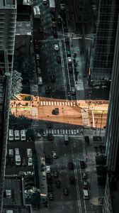 Preview wallpaper city, aerial view, street, buildings, movement, light, gray