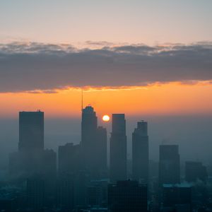 Preview wallpaper city, aerial view, sun, sunset, fog