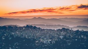Preview wallpaper city, aerial view, sunset, fog, sky