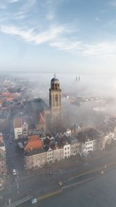 Preview wallpaper city, architecture, building, tower, fog