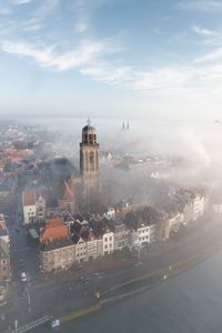 Preview wallpaper city, architecture, building, tower, fog