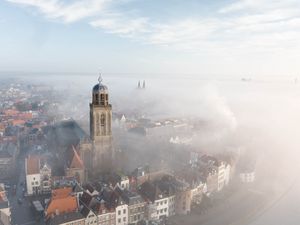 Preview wallpaper city, architecture, building, tower, fog