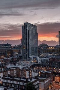 Preview wallpaper city, architecture, buildings, skyscraper, evening