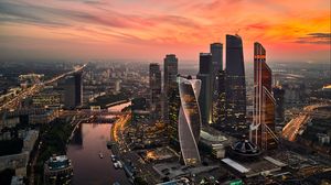 Preview wallpaper city, architecture, buildings, skyscrapers, sunset