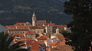 Preview wallpaper city, architecture, buildings, road, rocks