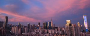 Preview wallpaper city, architecture, buildings, sunset, evening