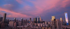 Preview wallpaper city, architecture, buildings, sunset, evening