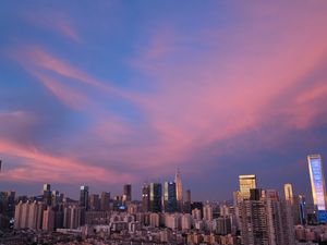 Preview wallpaper city, architecture, buildings, sunset, evening