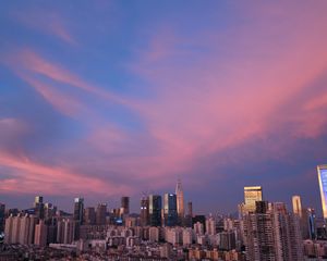 Preview wallpaper city, architecture, buildings, sunset, evening