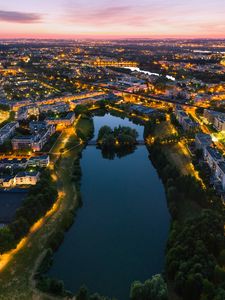 Preview wallpaper city, architecture, lake, lights, sunset