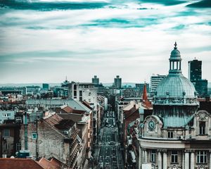 Preview wallpaper city, architecture, overview, sky, clouds, roofs