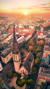 Preview wallpaper city, architecture, tower, buildings, sunset